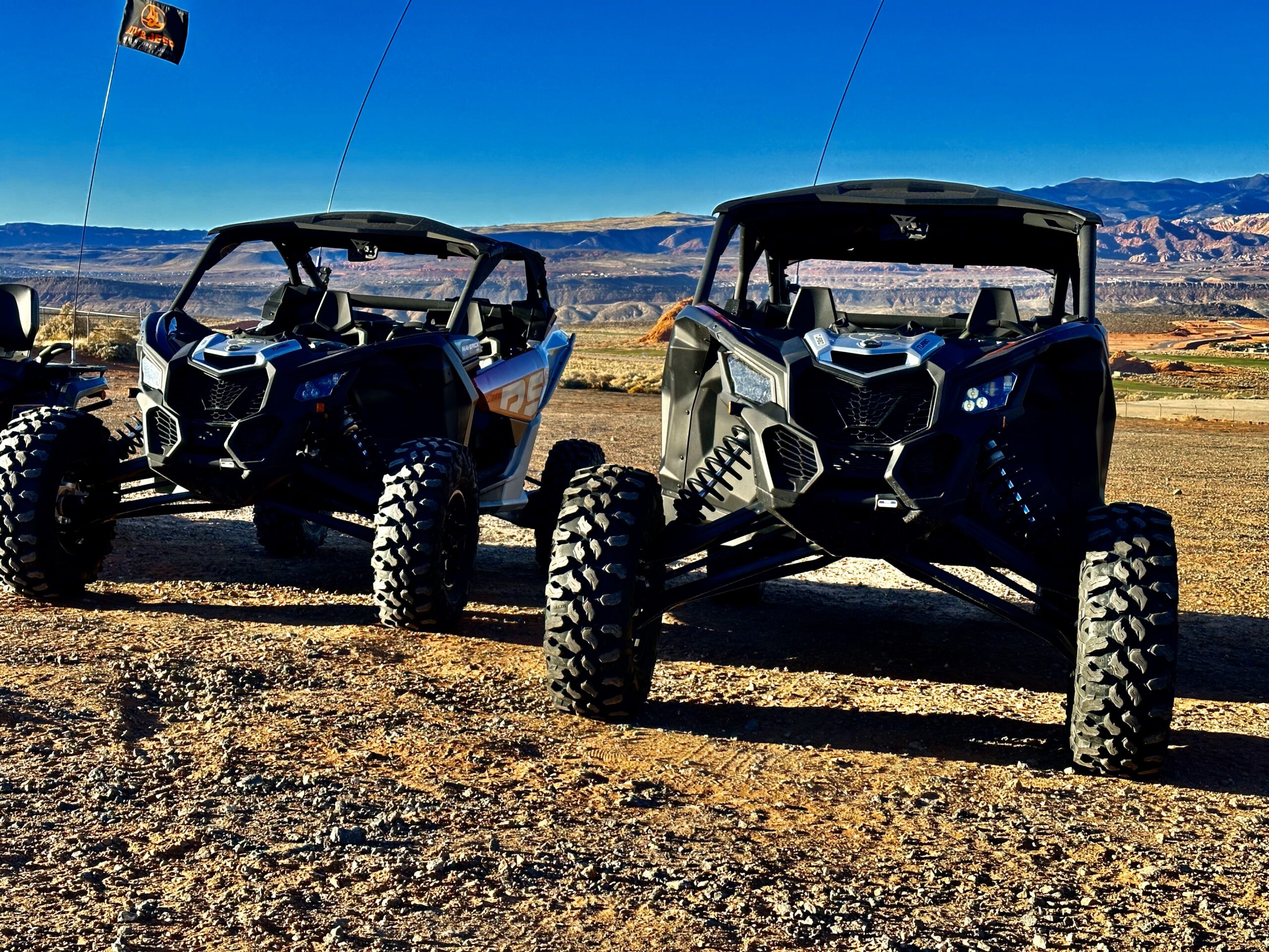 a truck that is sitting on top of a sandy beach
