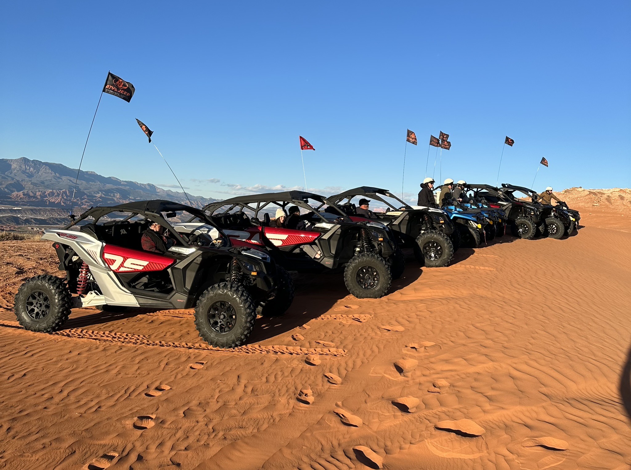 a truck driving down a dirt road