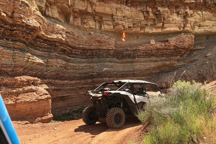 a truck that is sitting on a rock